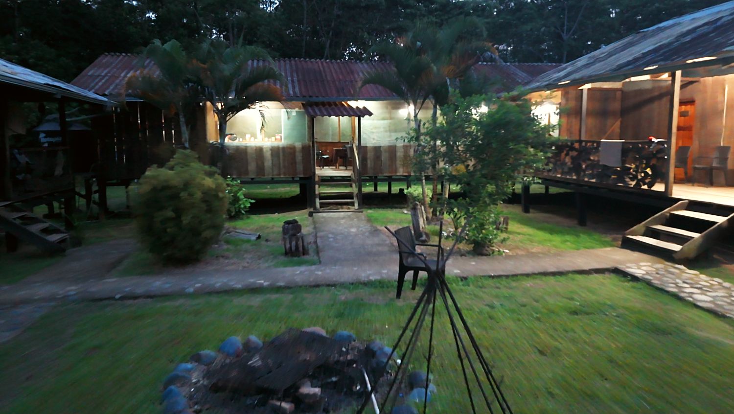 The base camp courtyard lit up at dusk